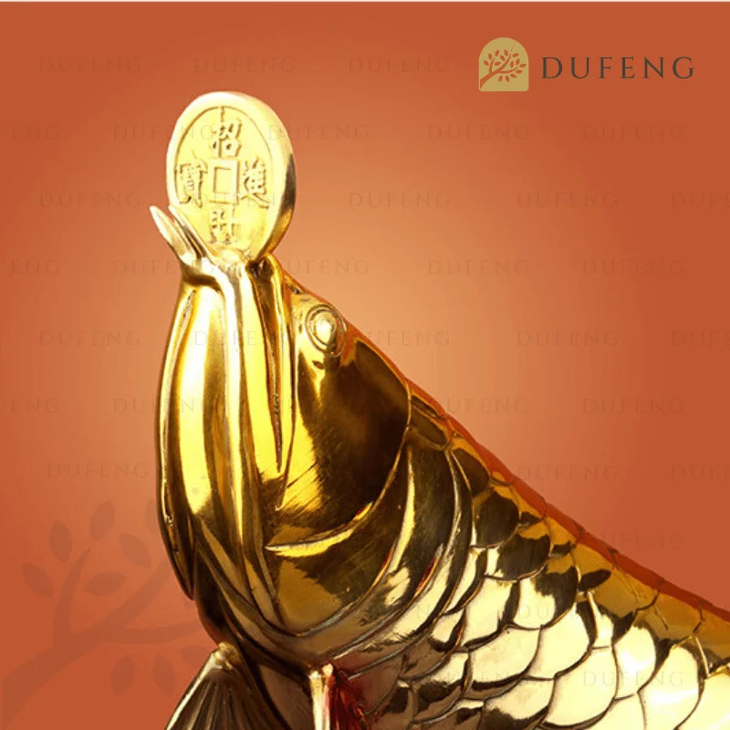 Golden Arwana With Lucky Coin