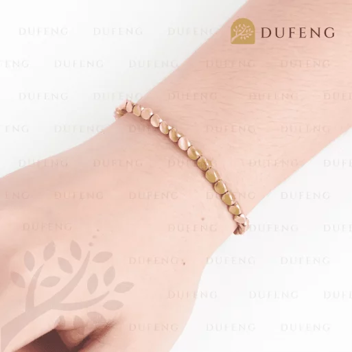 Gelang tael emas kemakmuran